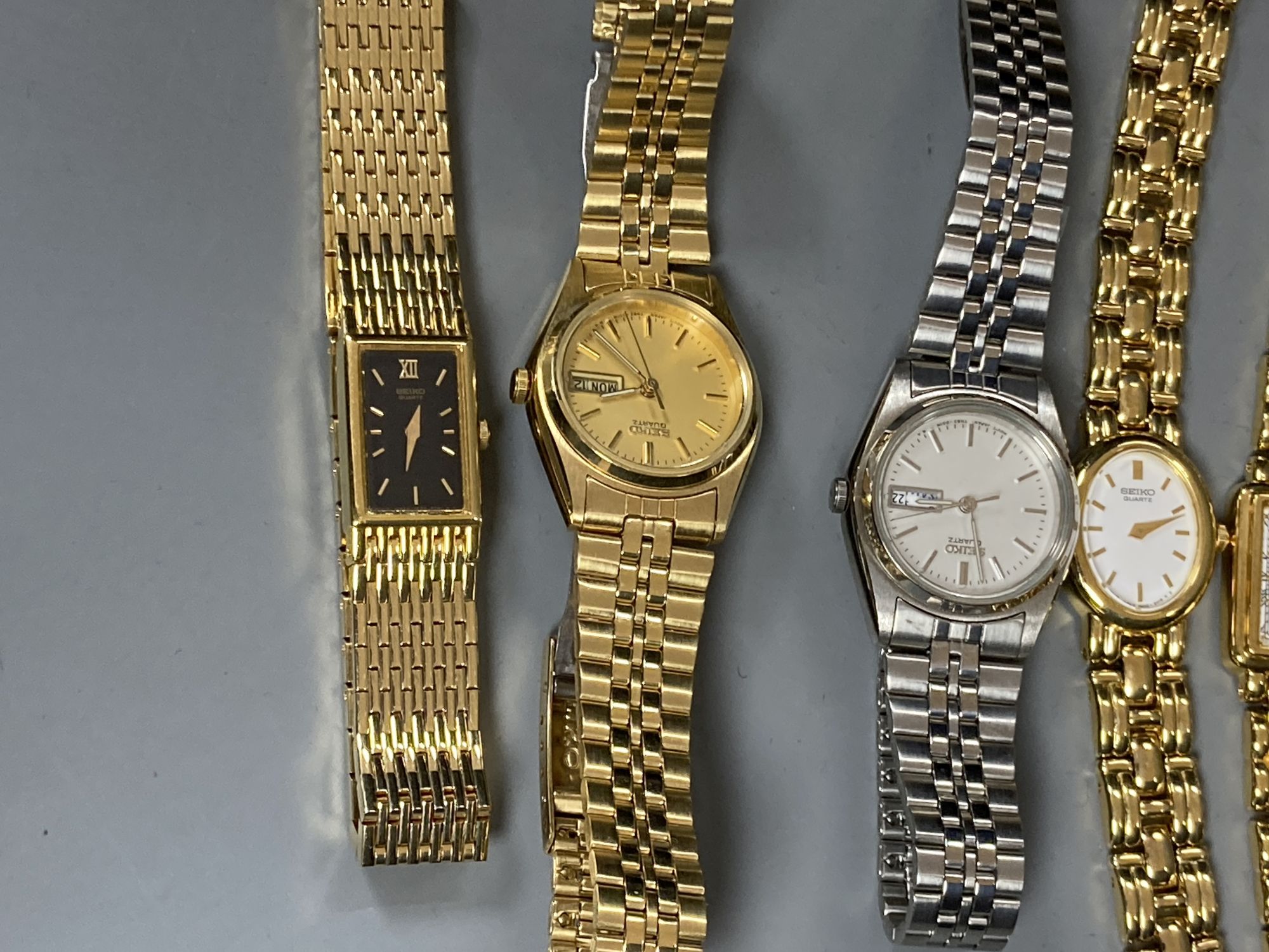 Three lady's 9ct gold wrist watches including two quartz, gross 29.9 grams and sixteen assorted lady's modern Seiko wrist watches.